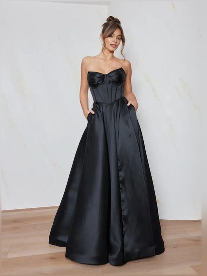 Black a-line floor-length formal dress with sweetheart neckline, full-length front view