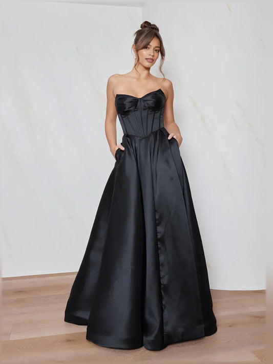 Black a-line floor-length formal dress with sweetheart neckline, full-length front view