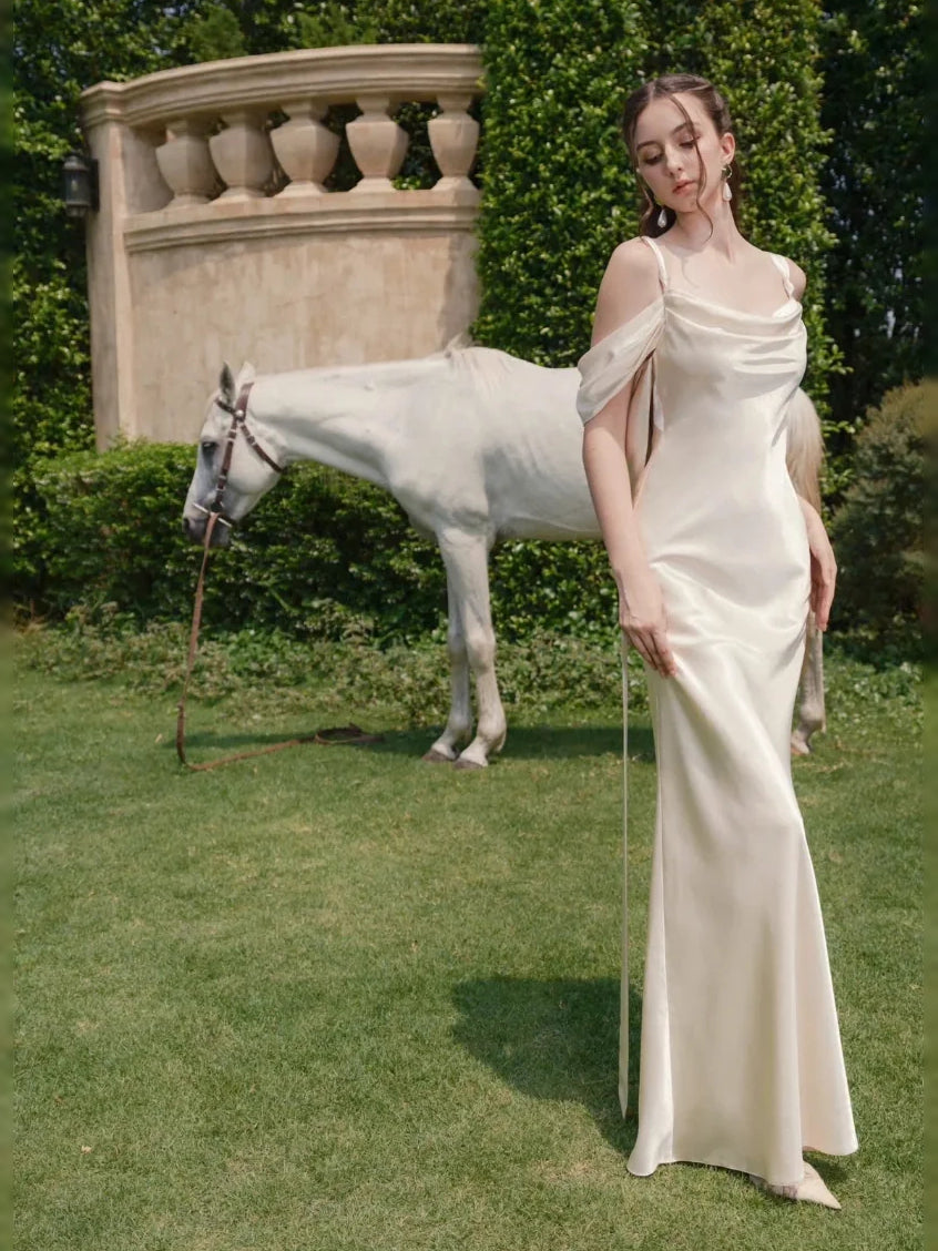 Ivory floor-length wedding dress, front view showing the sheath silhouette