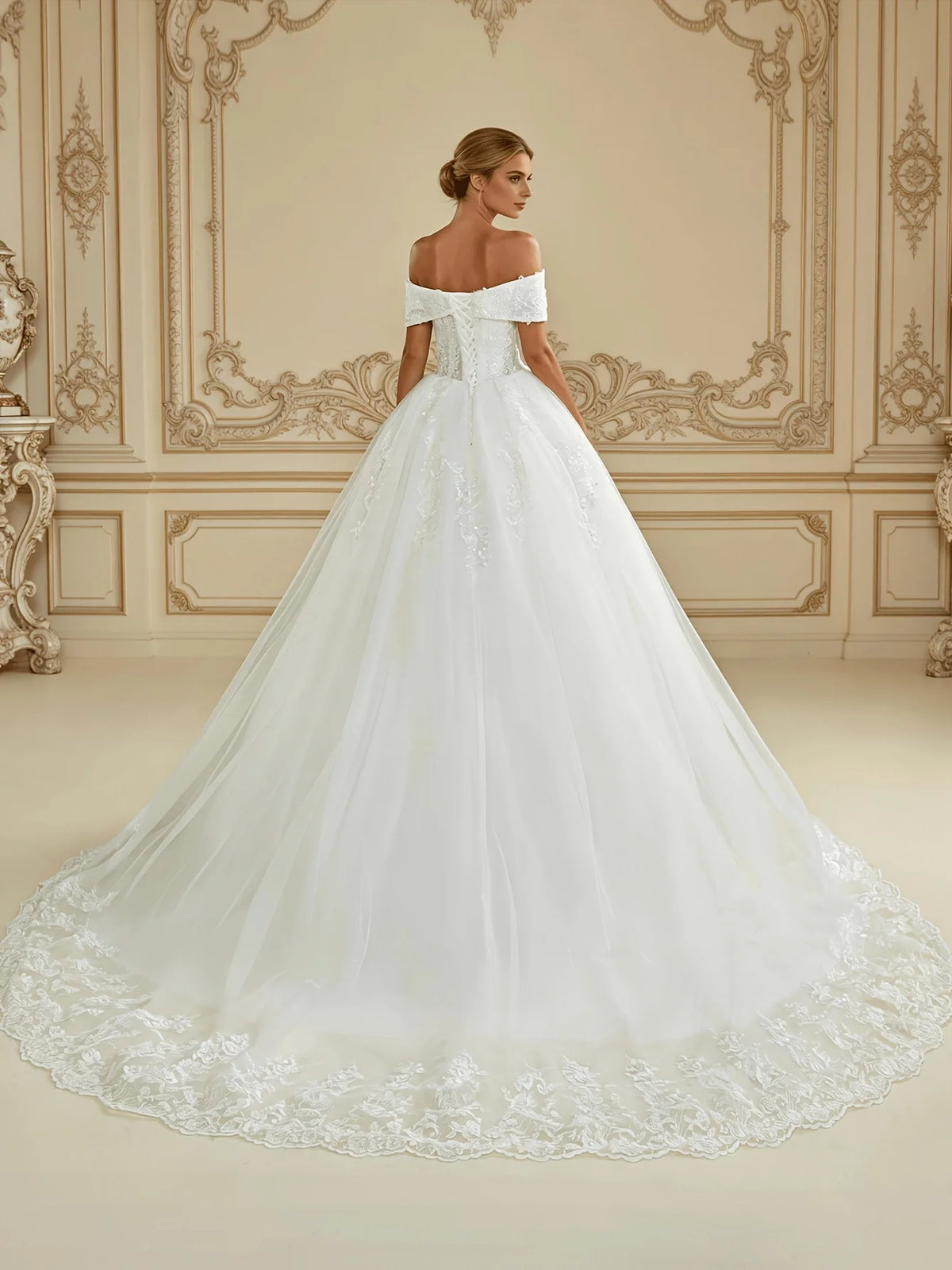 Ivory floor-length wedding dress, front view showing the ball-gown silhouette