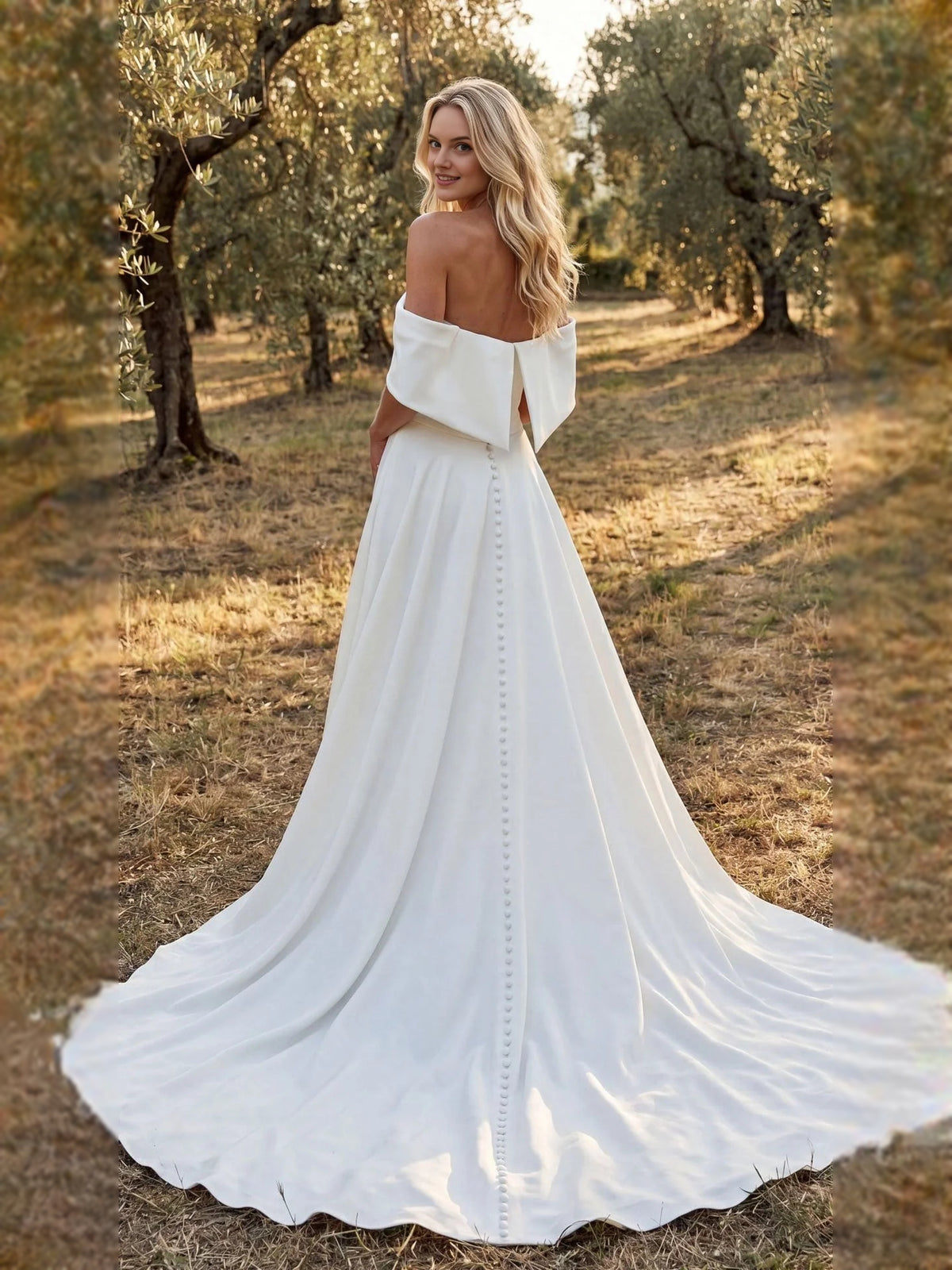 Ivory floor-length wedding dress, front view showing the a-line silhouette