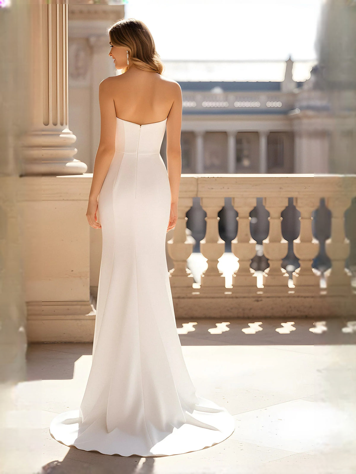 Ivory floor-length wedding dress, front view showing the mermaid silhouette
