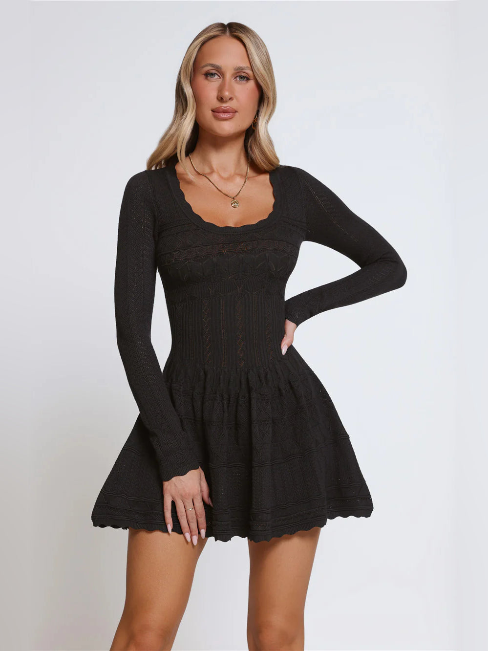 Black mini homecoming dress, front view showing the silhouette