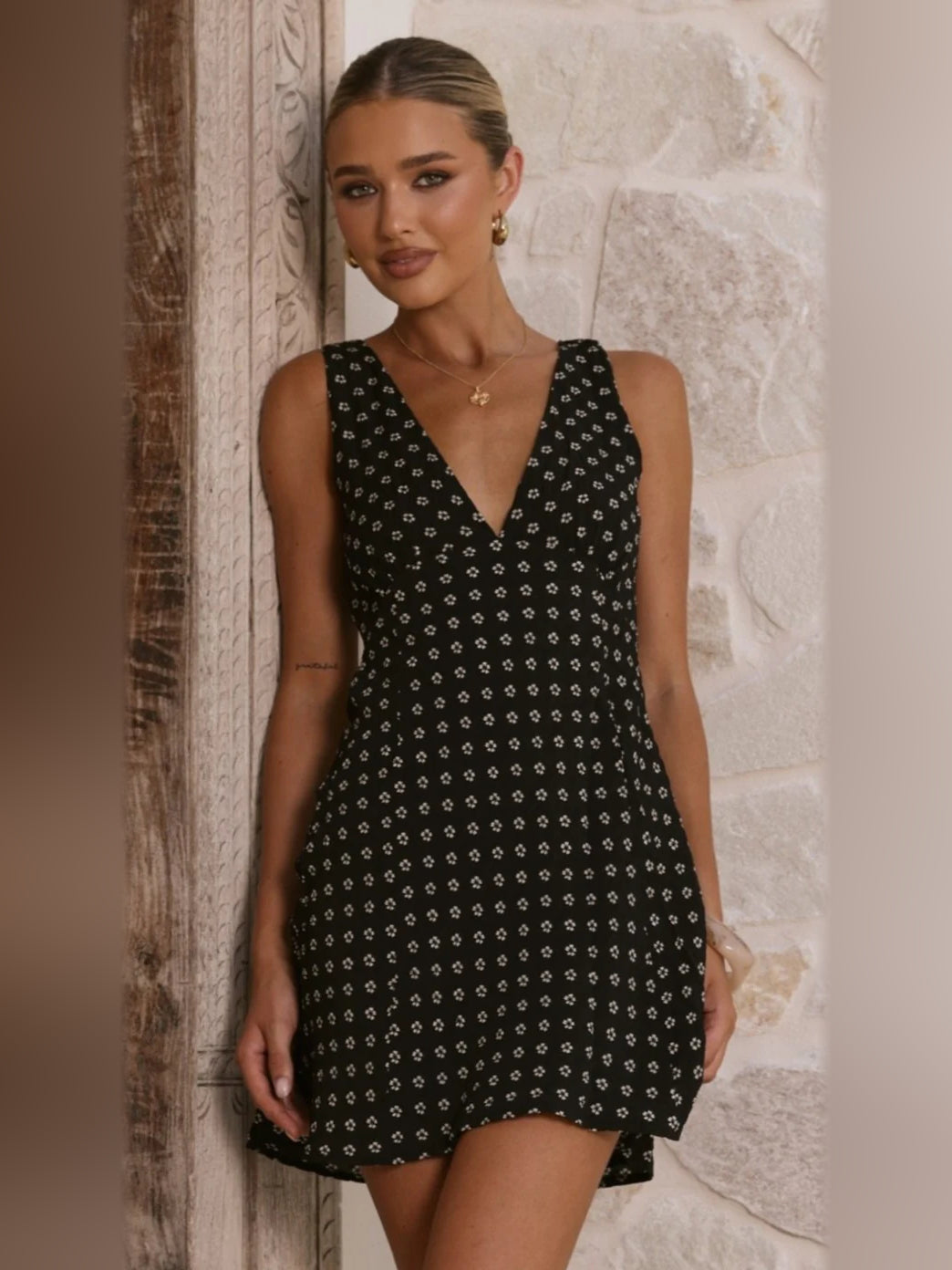 Black Floral mini homecoming dress, front view showing the silhouette
