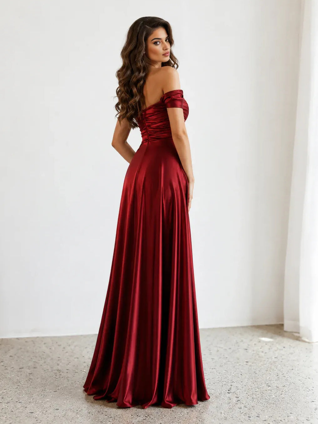 Burgundy floor-length prom dress, front view showing the a-line silhouette