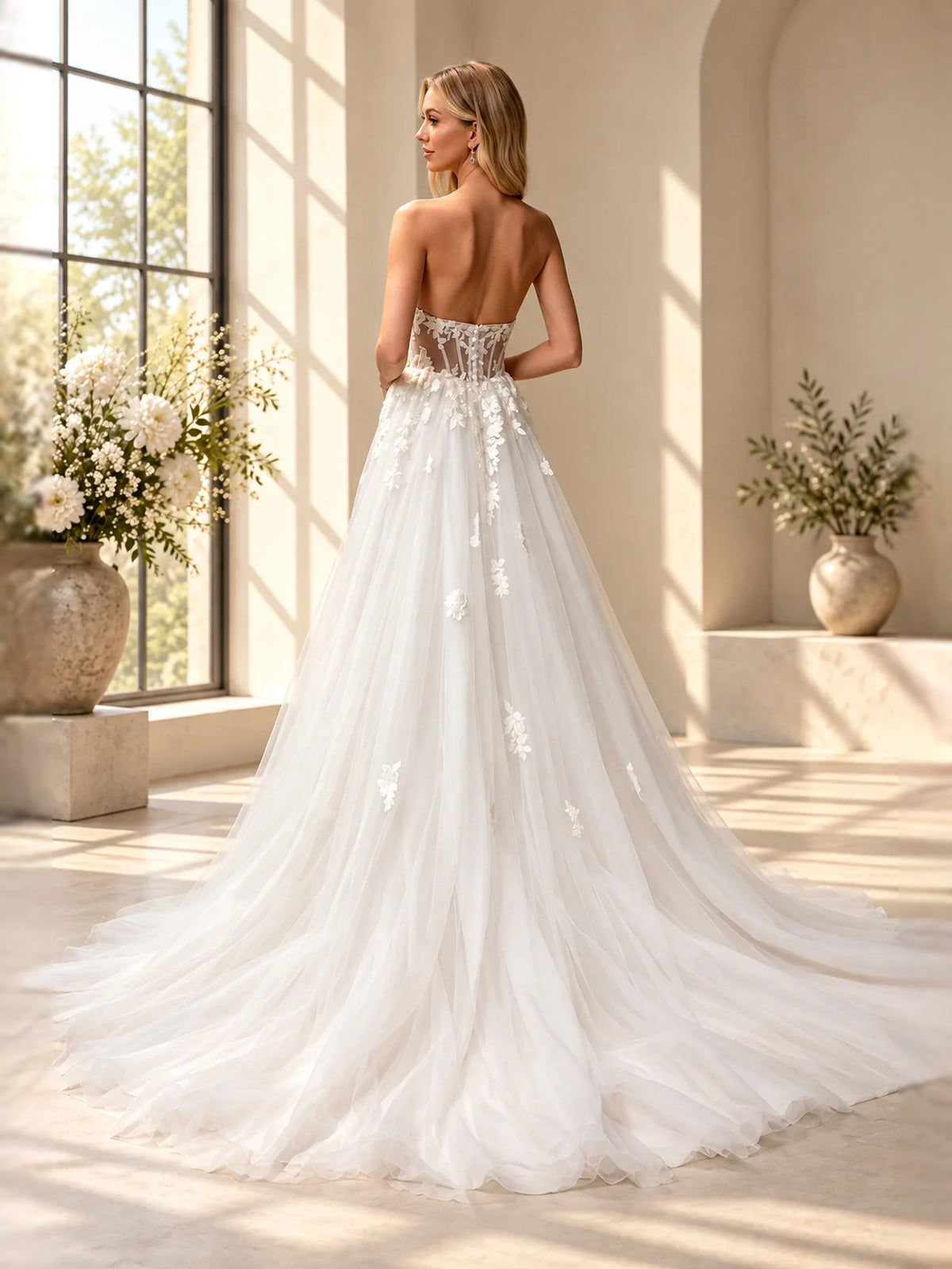 Ivory floor-length wedding dress, front view showing the a-line silhouette