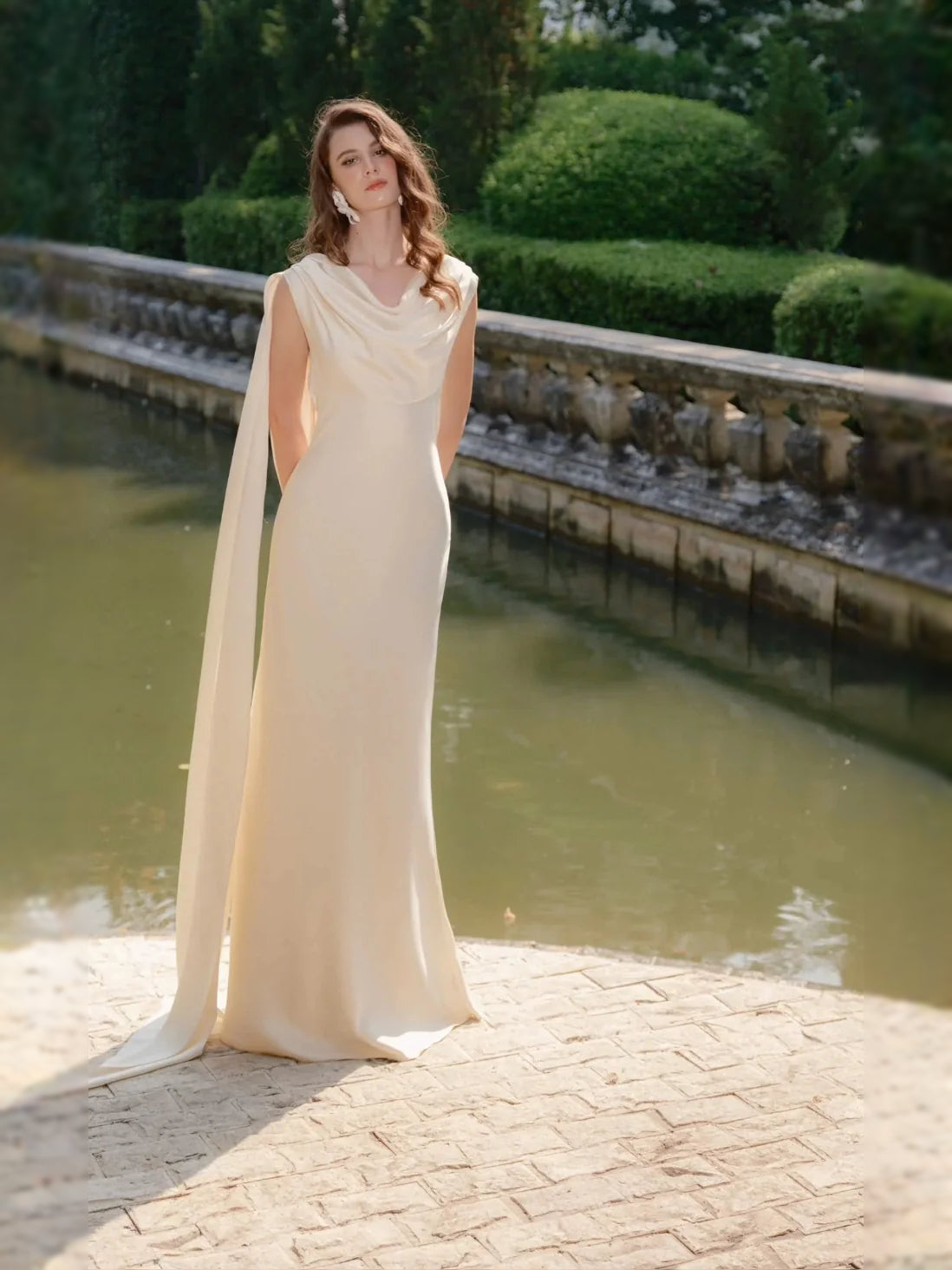 Ivory floor-length wedding dress, front view showing the sheath silhouette