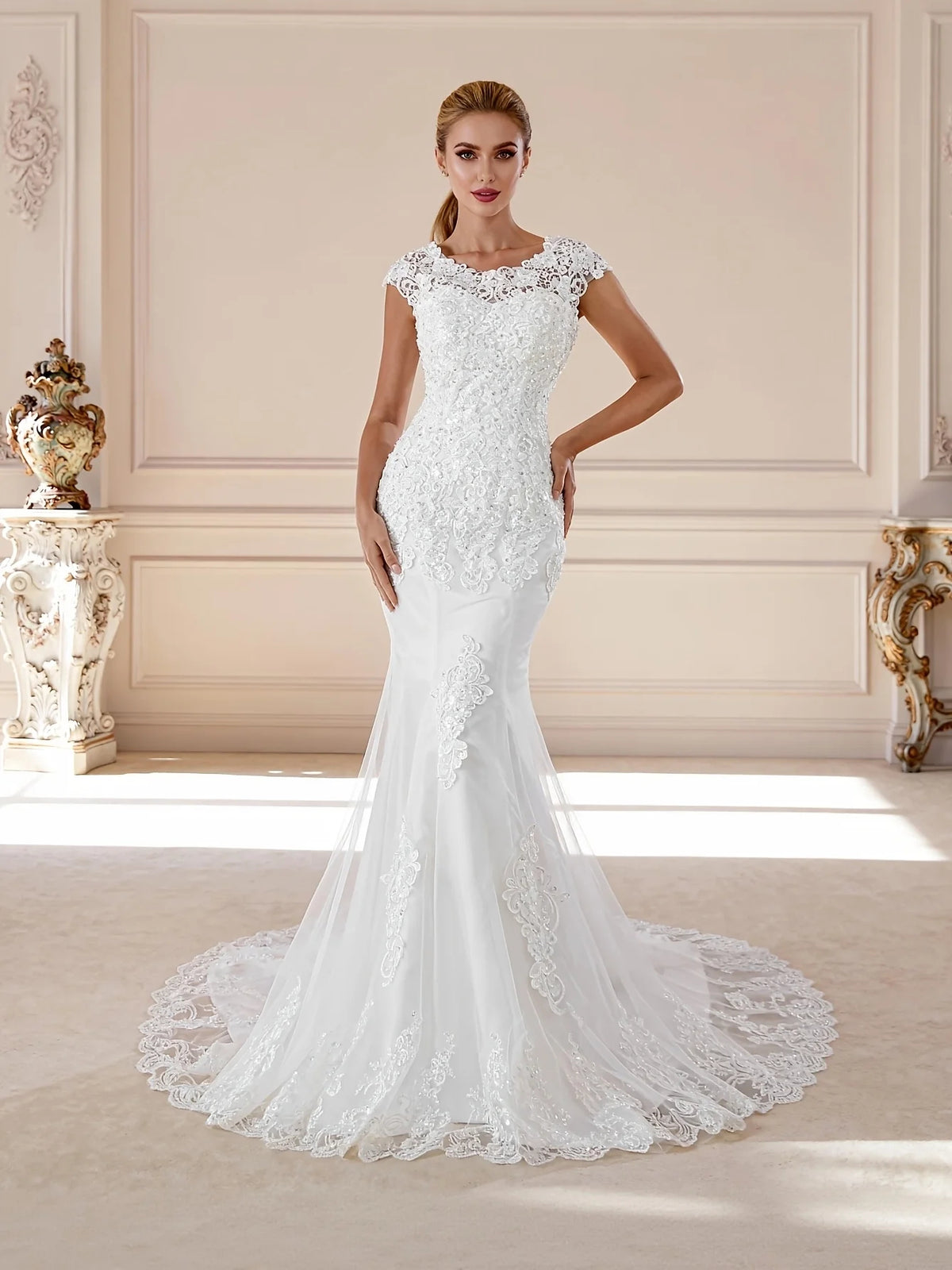 Ivory floor-length wedding dress, front view showing the mermaid silhouette
