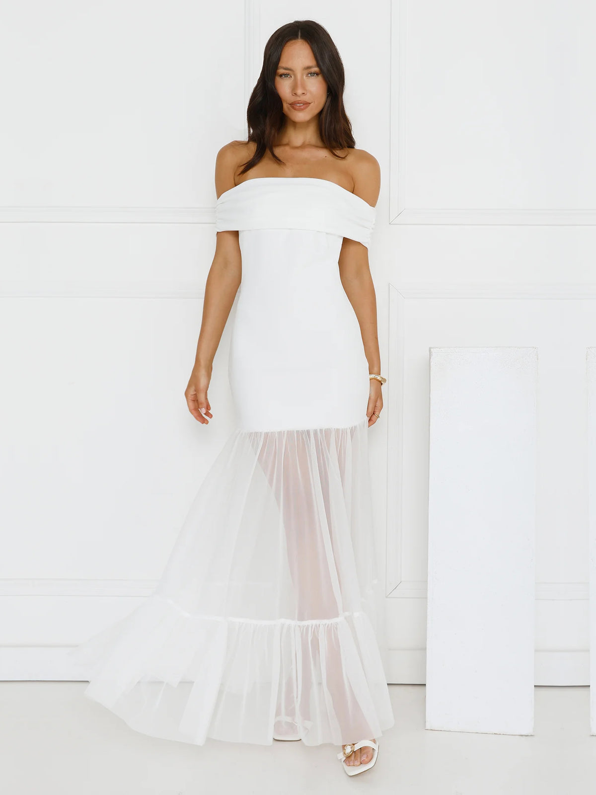 White sheath maxi formal dress with off-the-shoulder neckline, full-length front view