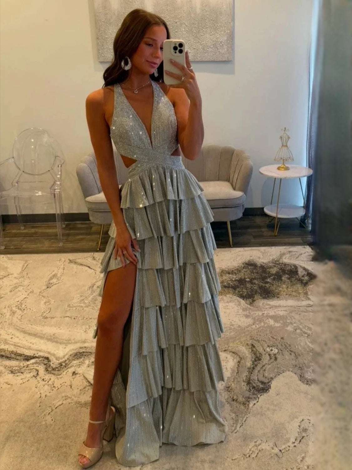 Silver floor-length prom dress, front view showing the a-line silhouette