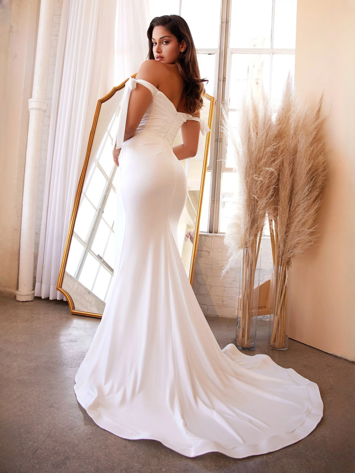 Ivory floor-length wedding dress, front view showing the a-line silhouette