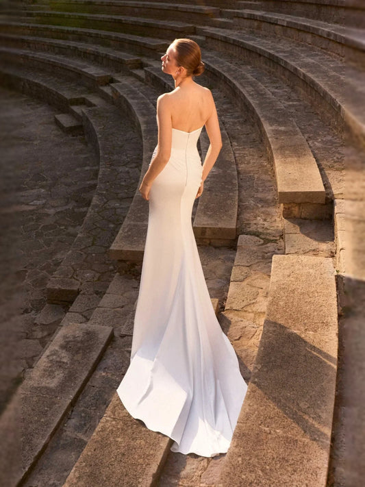 Ivory floor-length wedding dress, front view showing the mermaid silhouette