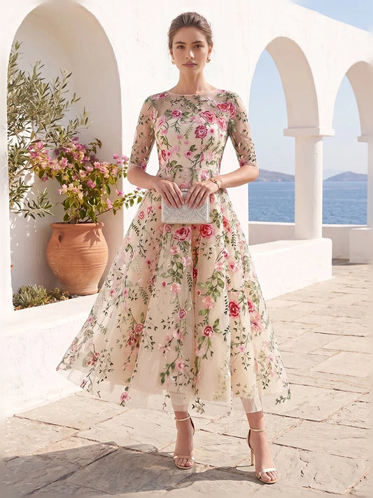 Champagne tea-length mother of the bride dress, front view showing the a-line silhouette