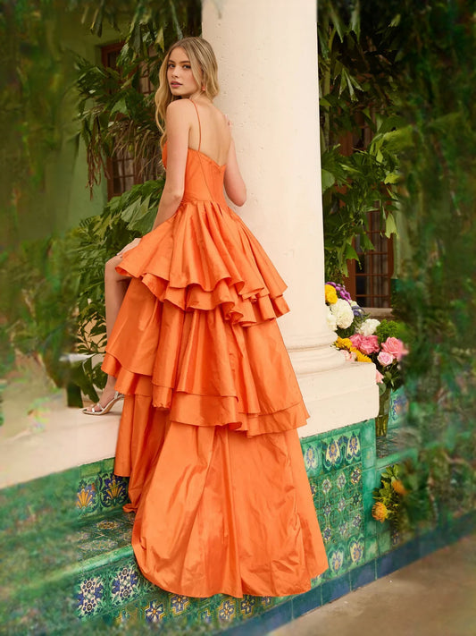 Orange high-low prom dress, front view showing the a-line silhouette
