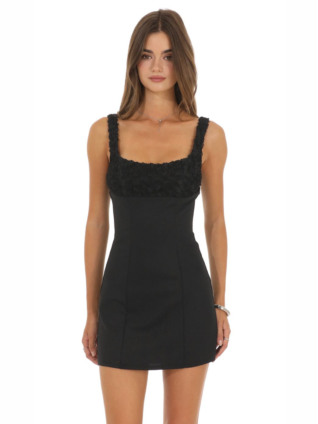 Black mini homecoming dress, front view showing the silhouette