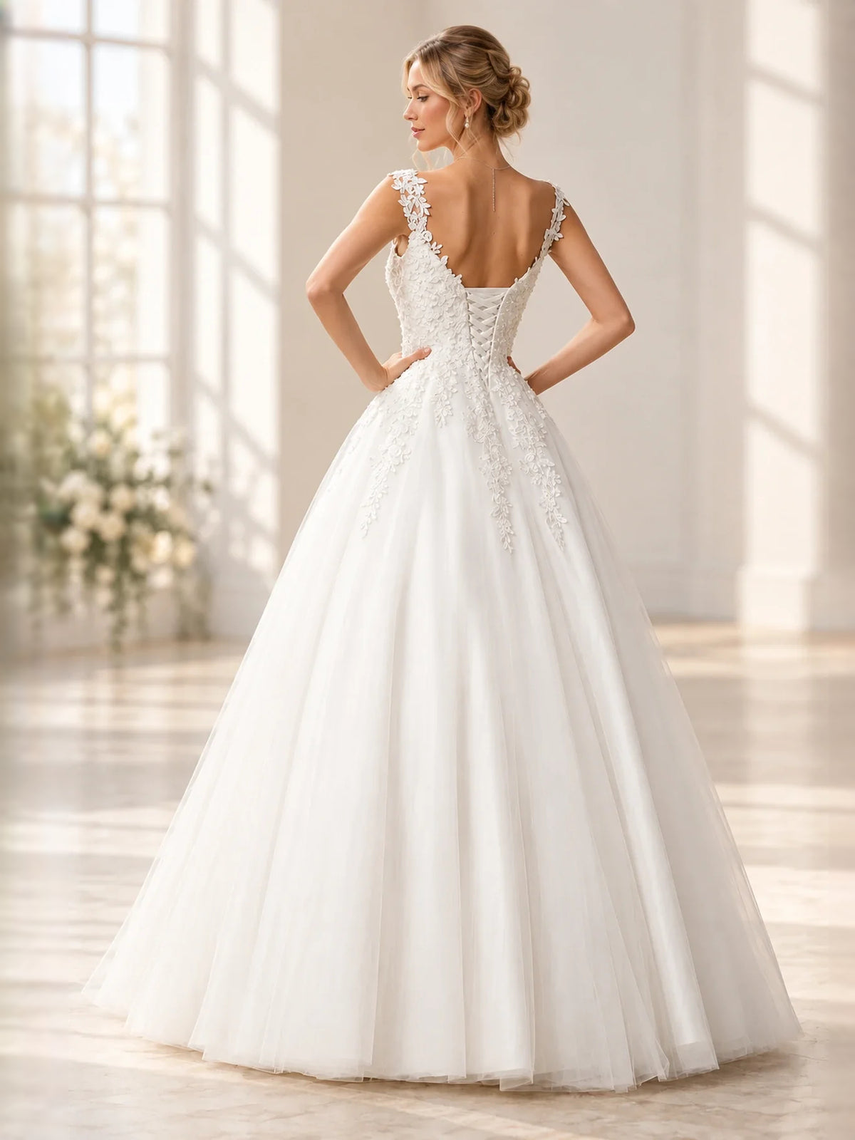 White floor-length wedding dress, front view showing the a-line silhouette