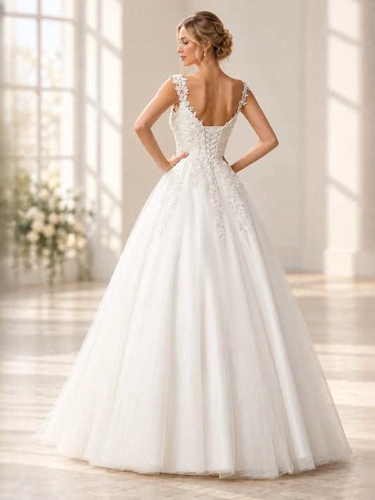 White floor-length wedding dress, front view showing the a-line silhouette