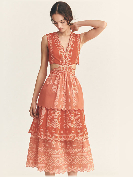 Orange midi formal dress with tiered skirt, full-length front view