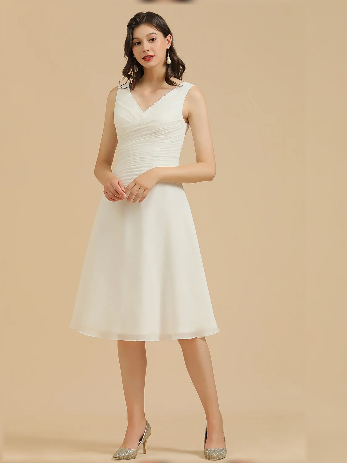White mini bridesmaid dress, front view showing the a-line silhouette