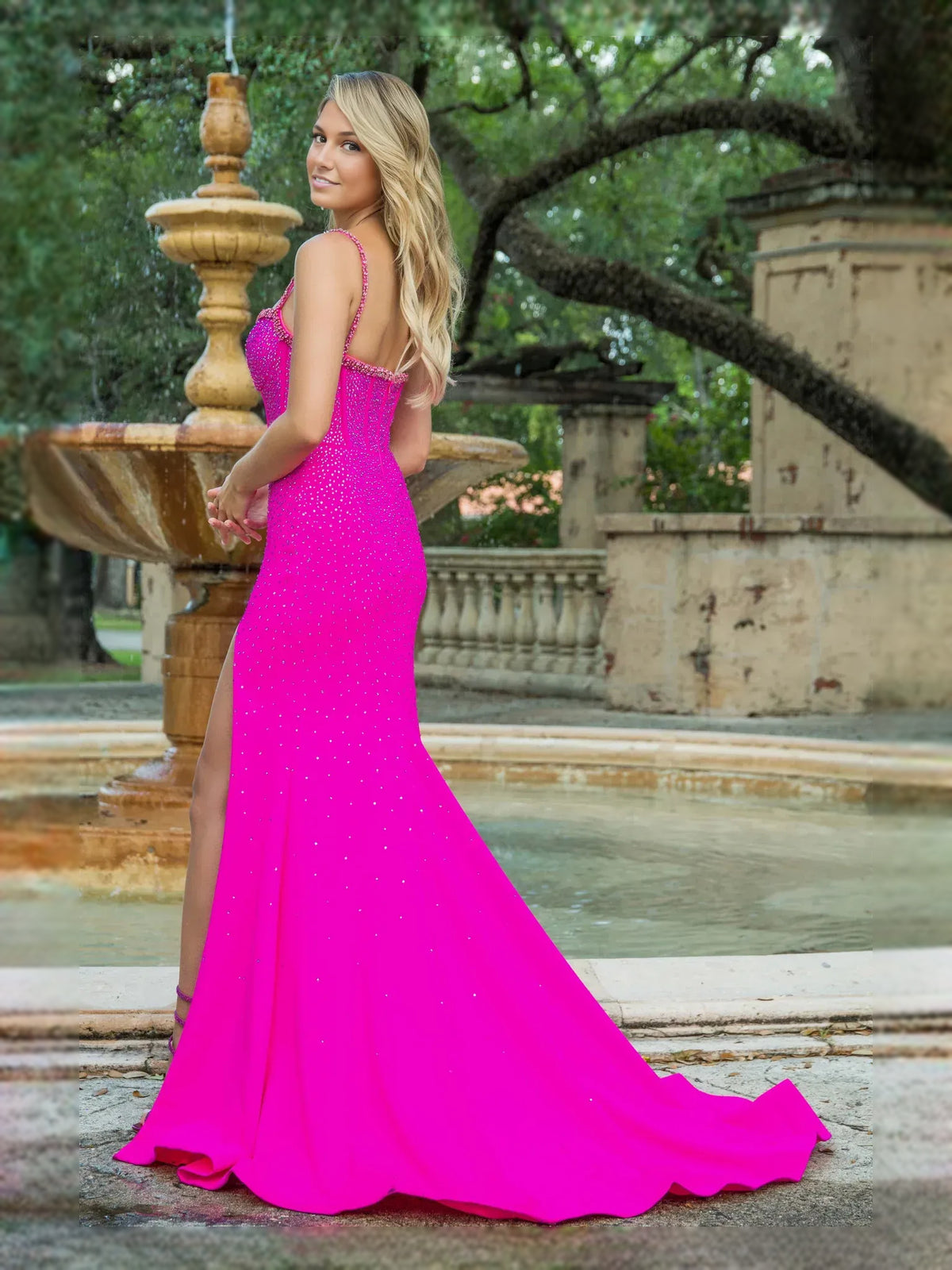 Fuchsia floor-length prom dress, front view showing the mermaid silhouette