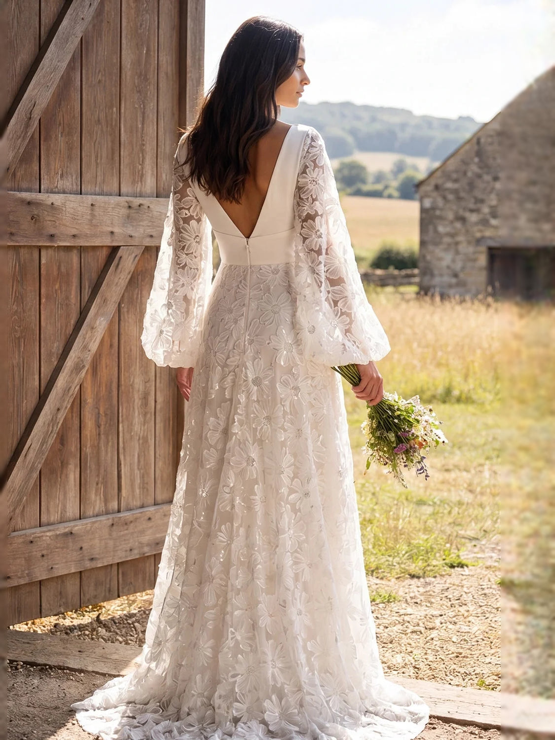 Ivory floor-length wedding dress, front view showing the a-line silhouette