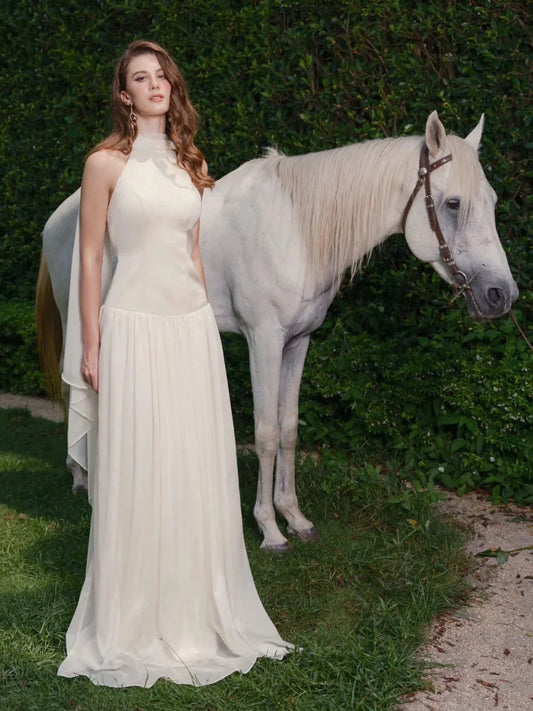 Ivory floor-length wedding dress, front view showing the a-line silhouette