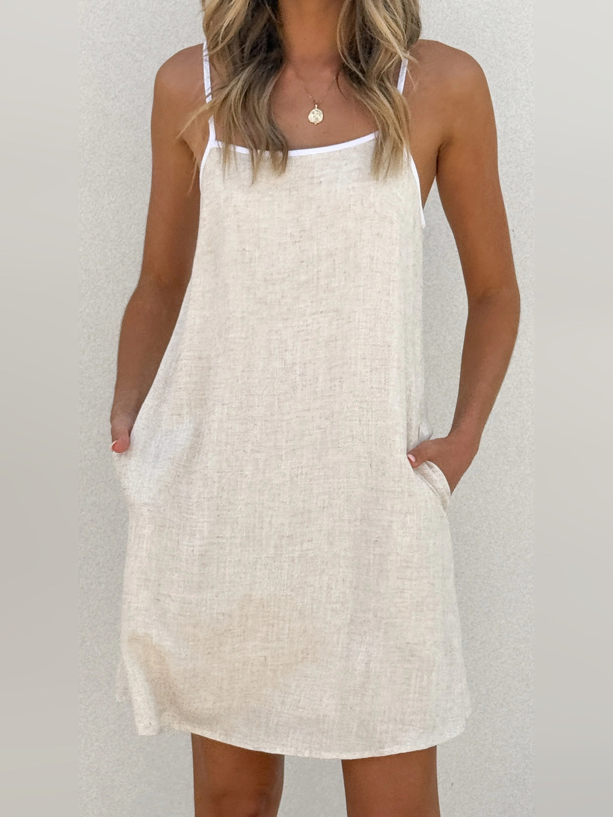 White mini homecoming dress, front view showing the silhouette