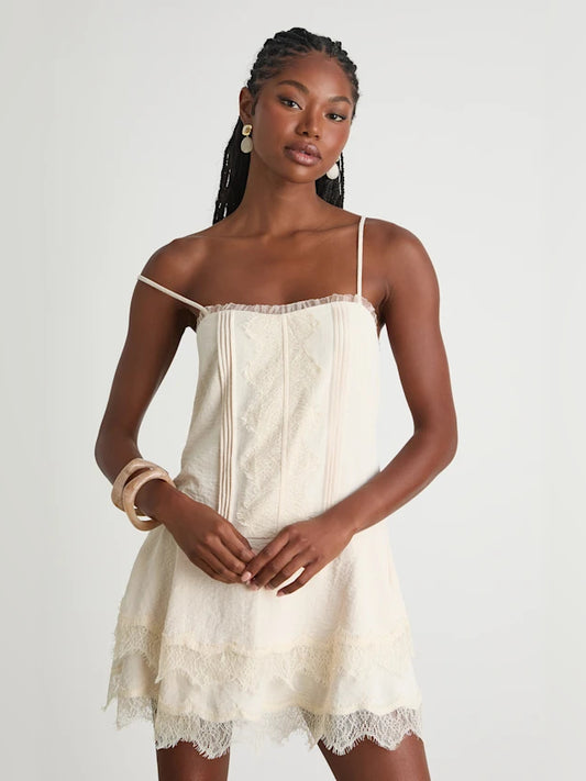 Cream mini homecoming dress, front view showing the silhouette