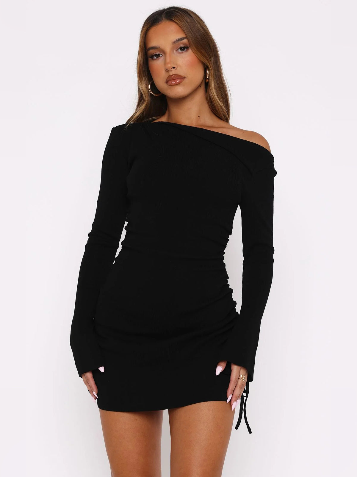 Black mini homecoming dress, front view showing the silhouette