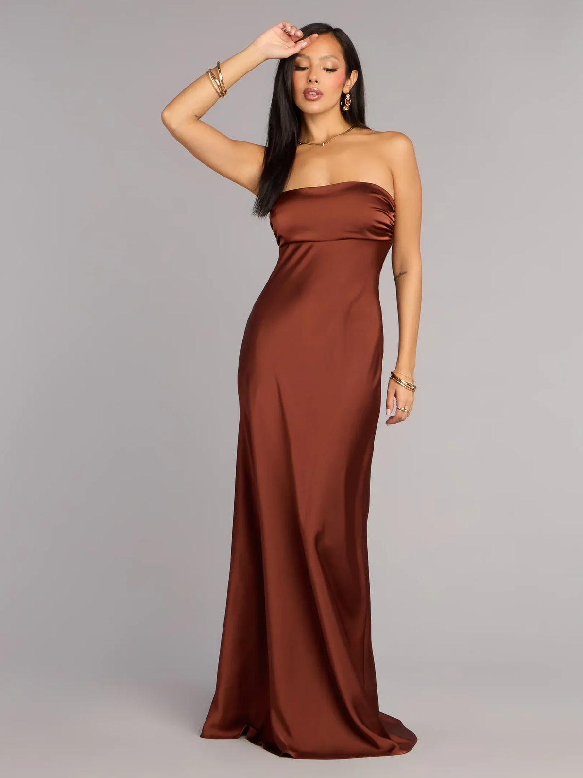 Brown sheath floor-length formal dress with strapless neckline, full-length front view