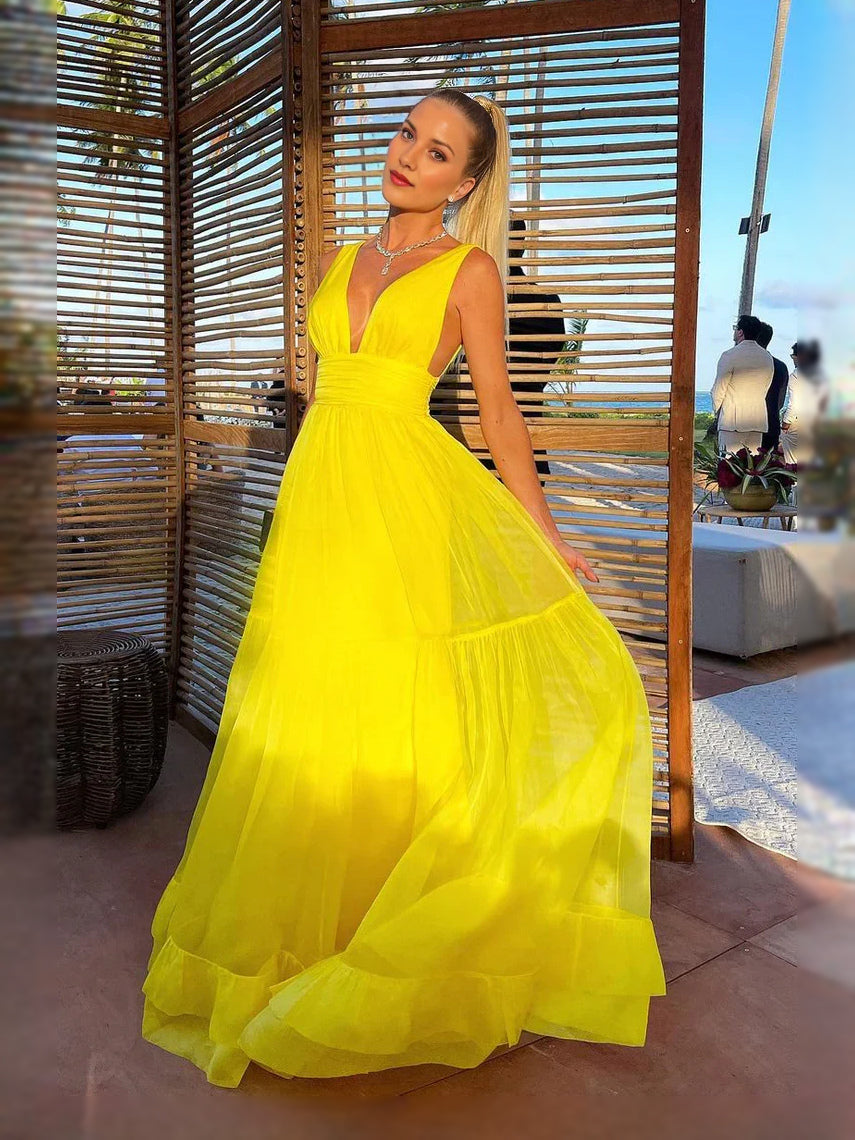 Yellow maxi prom dress, front view showing the a-line silhouette
