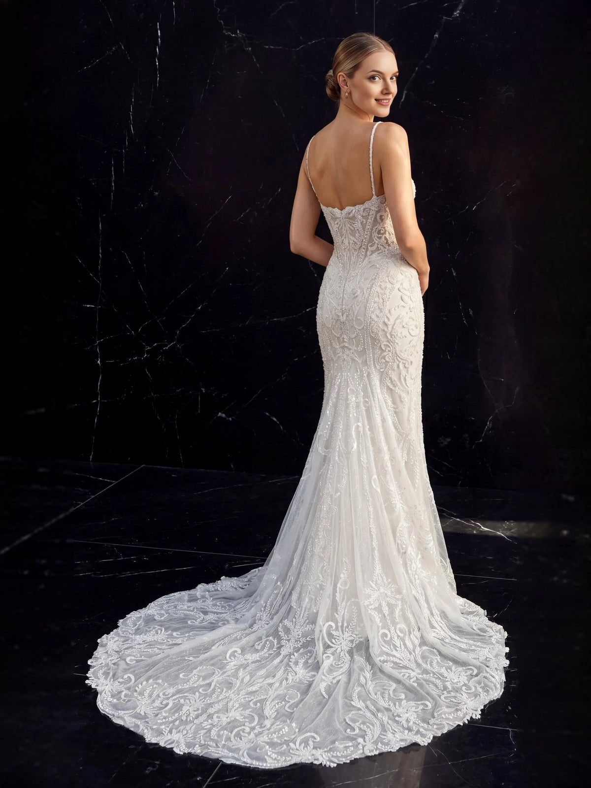 Ivory floor-length wedding dress, front view showing the mermaid silhouette