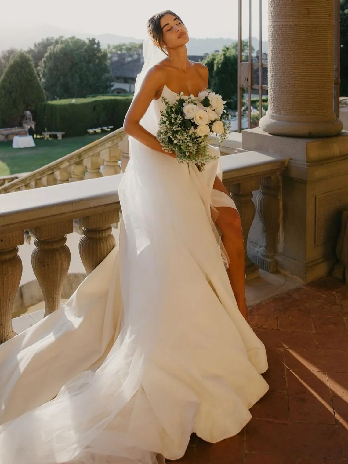 White floor-length wedding dress, front view showing the a-line silhouette