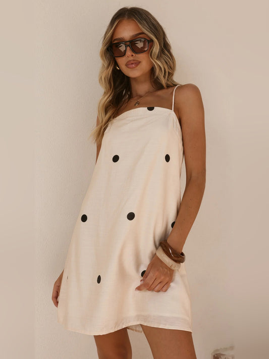 Cream mini homecoming dress, front view showing the silhouette