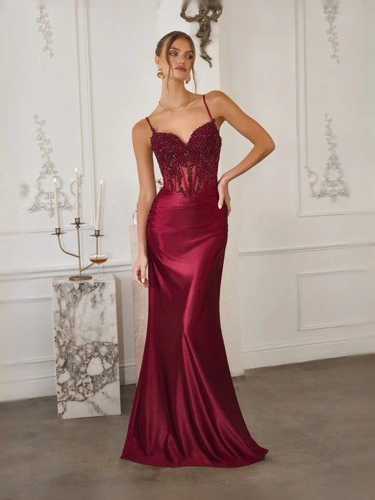 Burgundy floor-length prom dress, front view showing the mermaid silhouette