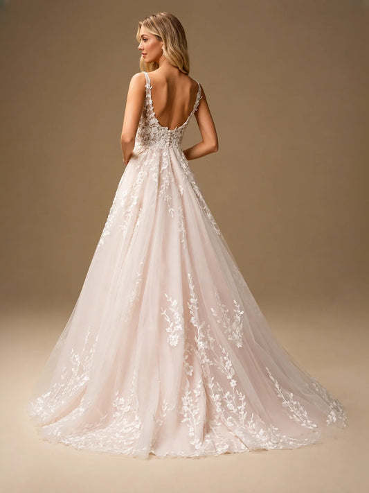 Ivory floor-length wedding dress, front view showing the a-line silhouette