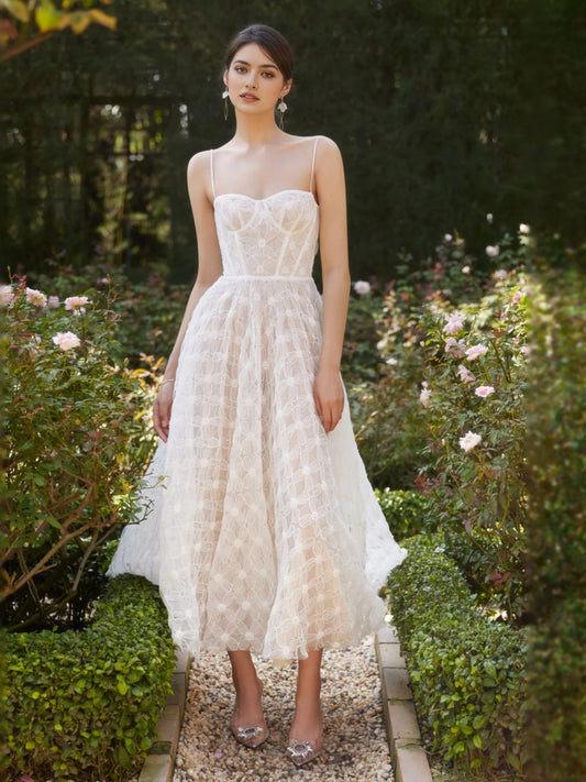 Ivory midi wedding dress, front view showing the a-line silhouette