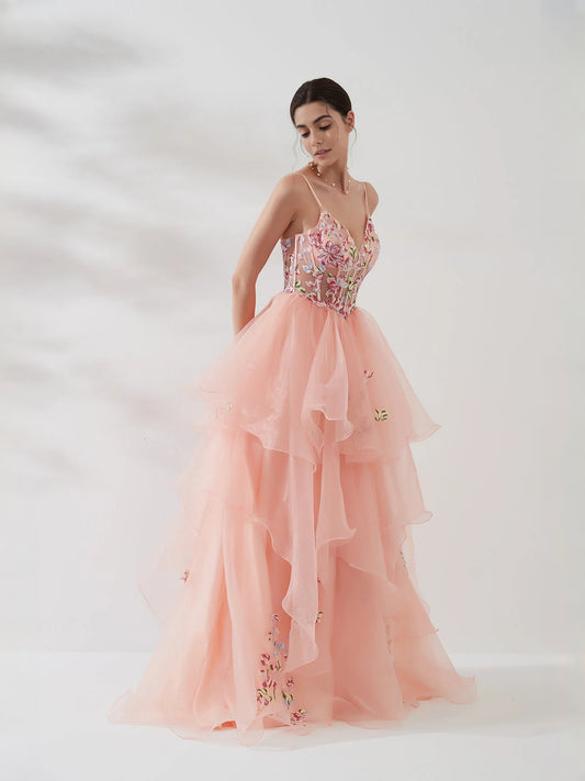 Coral floor-length prom dress, front view showing the a-line silhouette