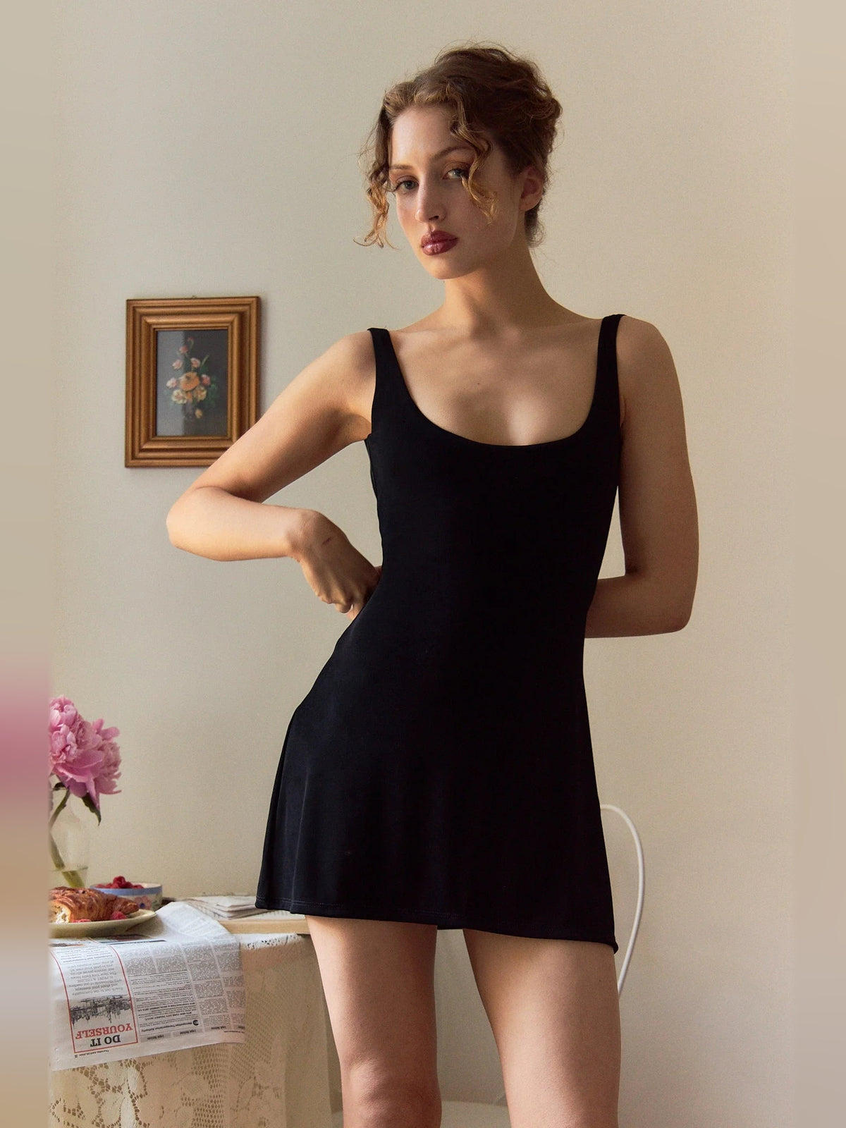 Black mini homecoming dress, alternate view showing the full-length silhouette