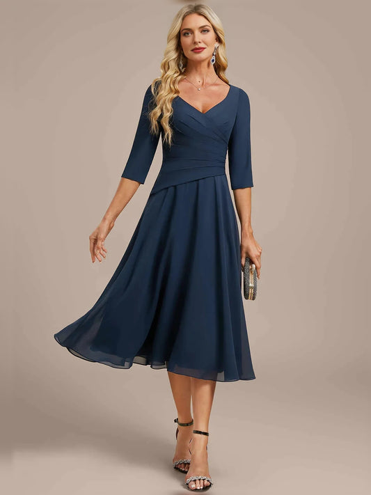 Dark Navy knee-length mother of the bride dress, front view showing the a-line silhouette