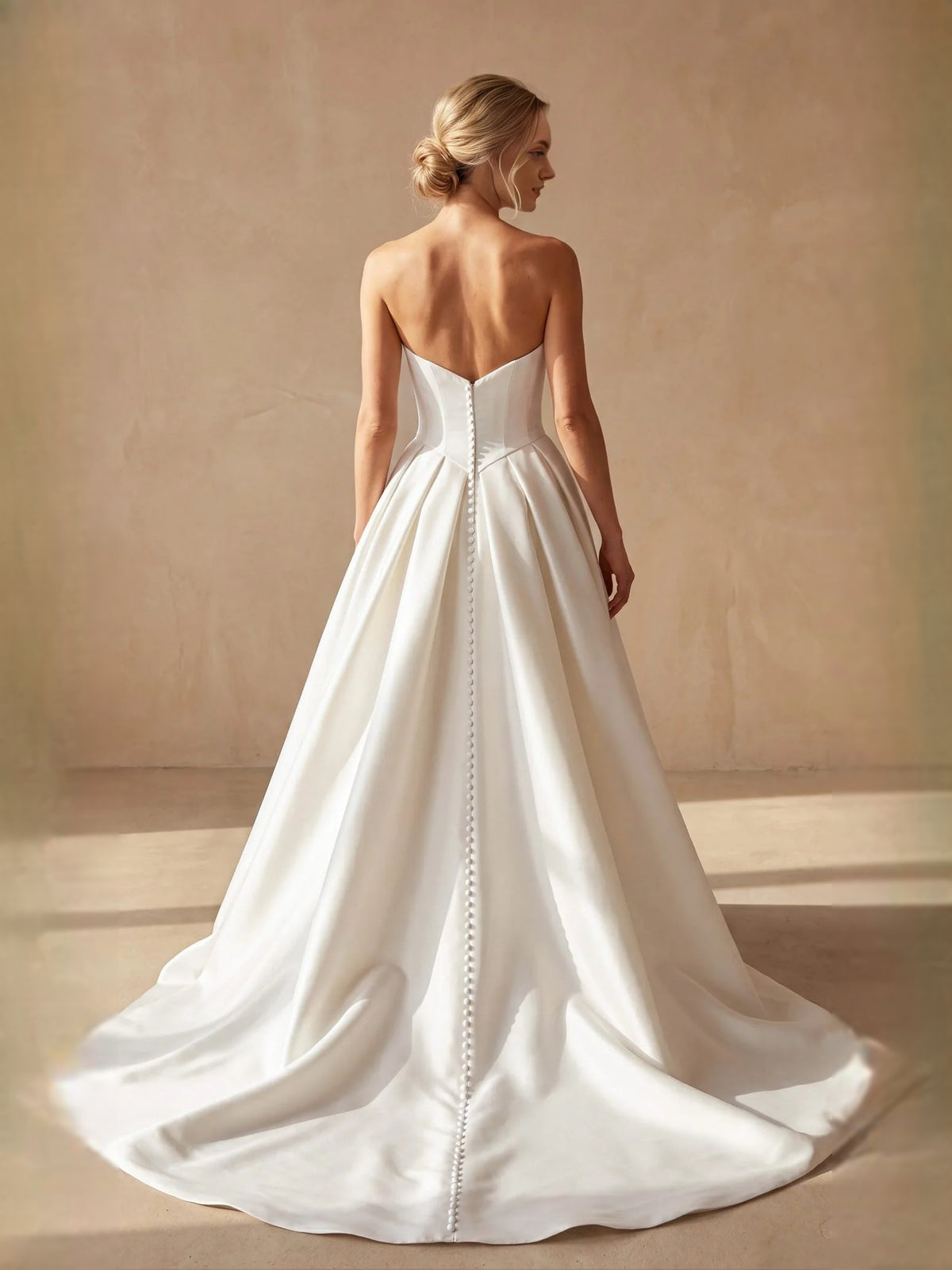 Ivory floor-length wedding dress, front view showing the column silhouette