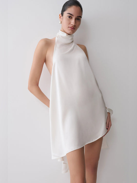 Ivory mini homecoming dress, front view showing the asymmetrical silhouette