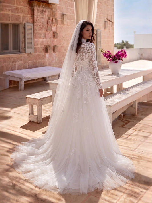 Ivory floor-length wedding dress, front view showing the a-line silhouette