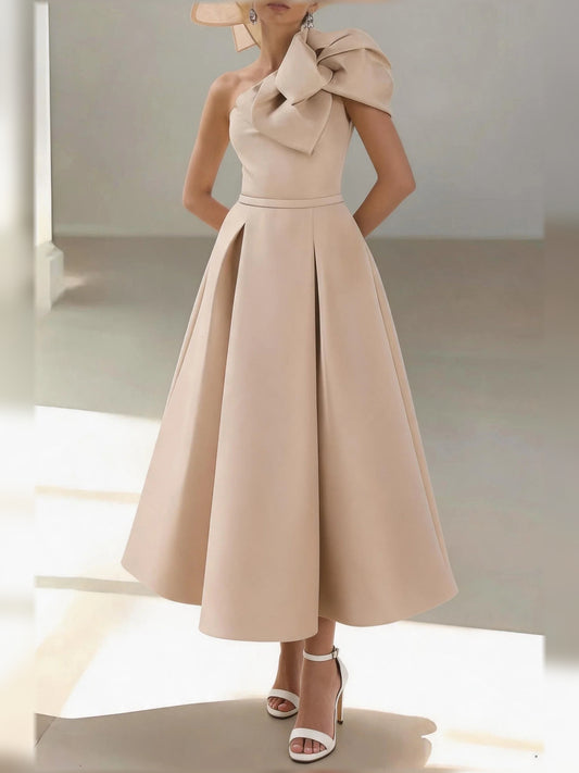 Champagne midi mother of the bride dress, front view showing the a-line silhouette