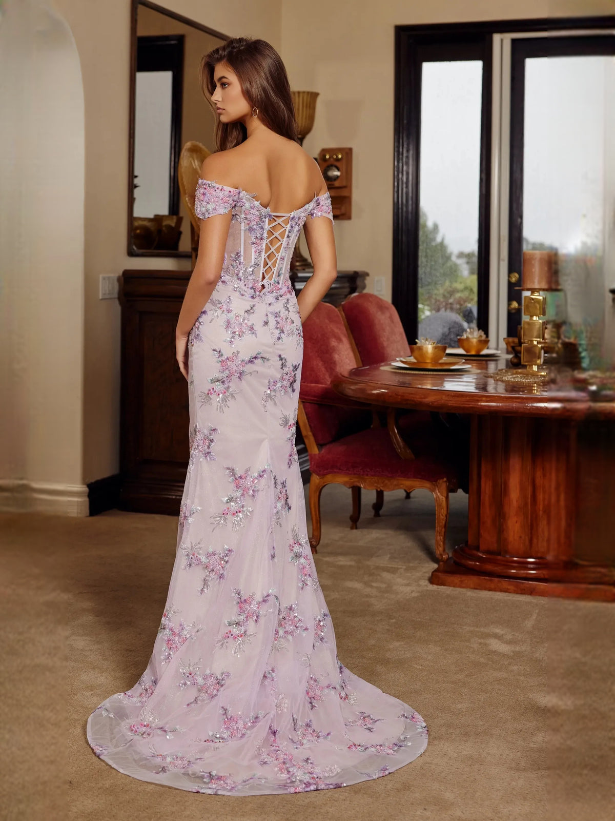 Silver floor-length prom dress, front view showing the mermaid silhouette