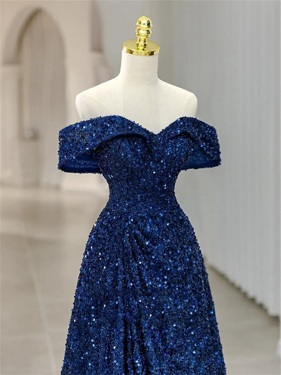 Navy floor-length prom dress, front view showing the mermaid silhouette