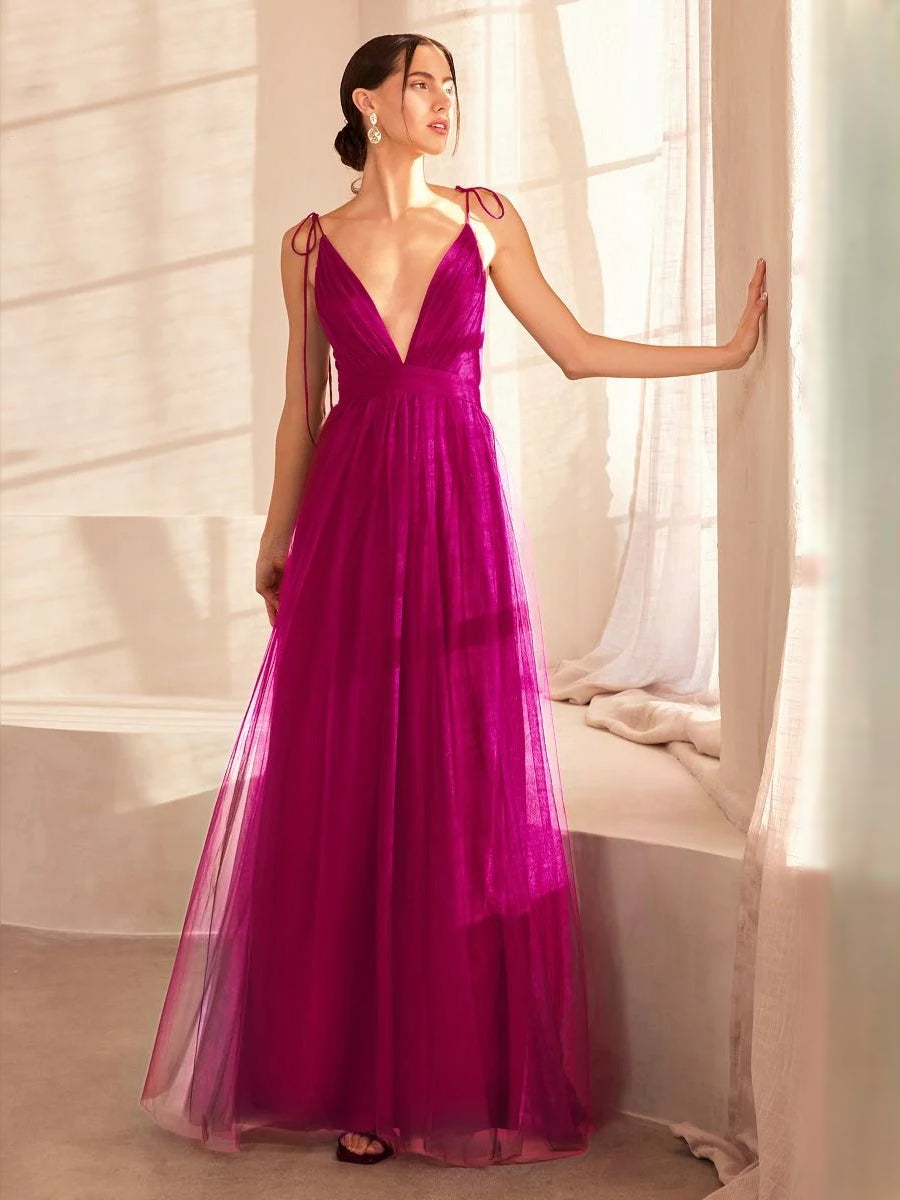 Fuchsia maxi prom dress, front view showing the a-line silhouette