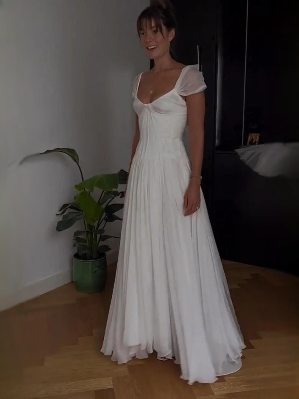 Ivory short wedding dress, front view showing the a-line silhouette