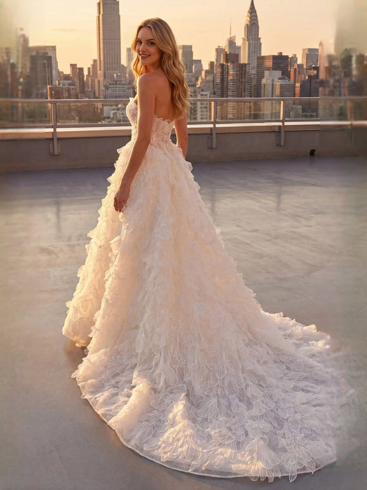 Ivory floor-length wedding dress, front view showing the ball-gown silhouette