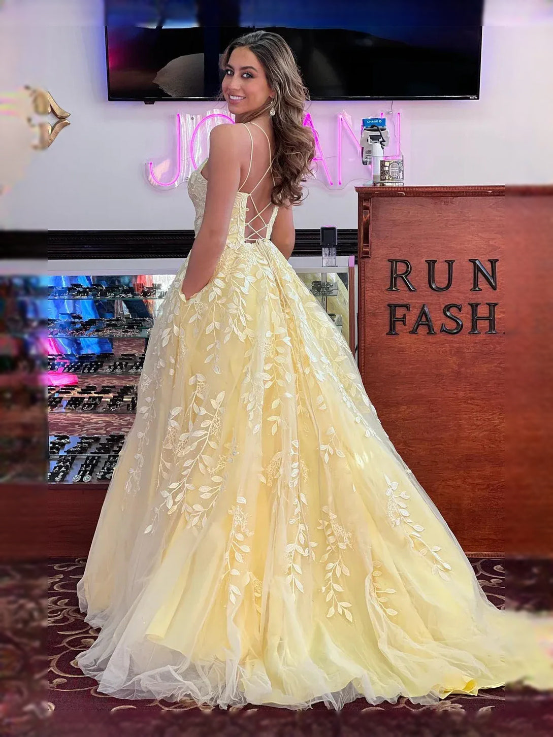 Apricot maxi prom dress, front view showing the a-line silhouette